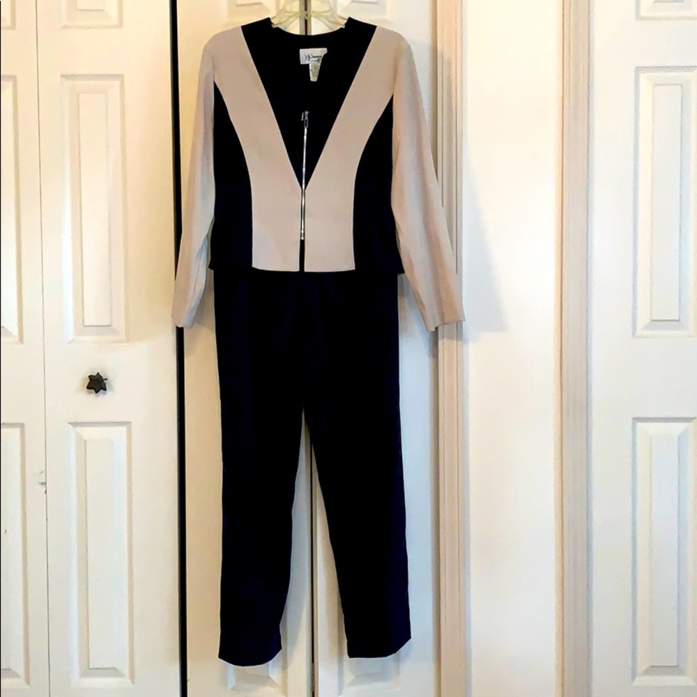 Navy blue beige two piece suit.